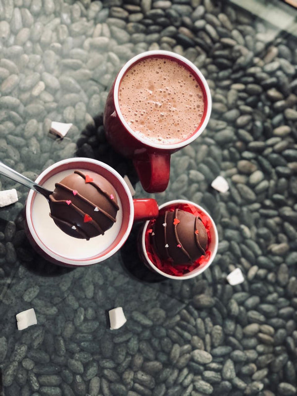 hot chocolate bomb in red mug